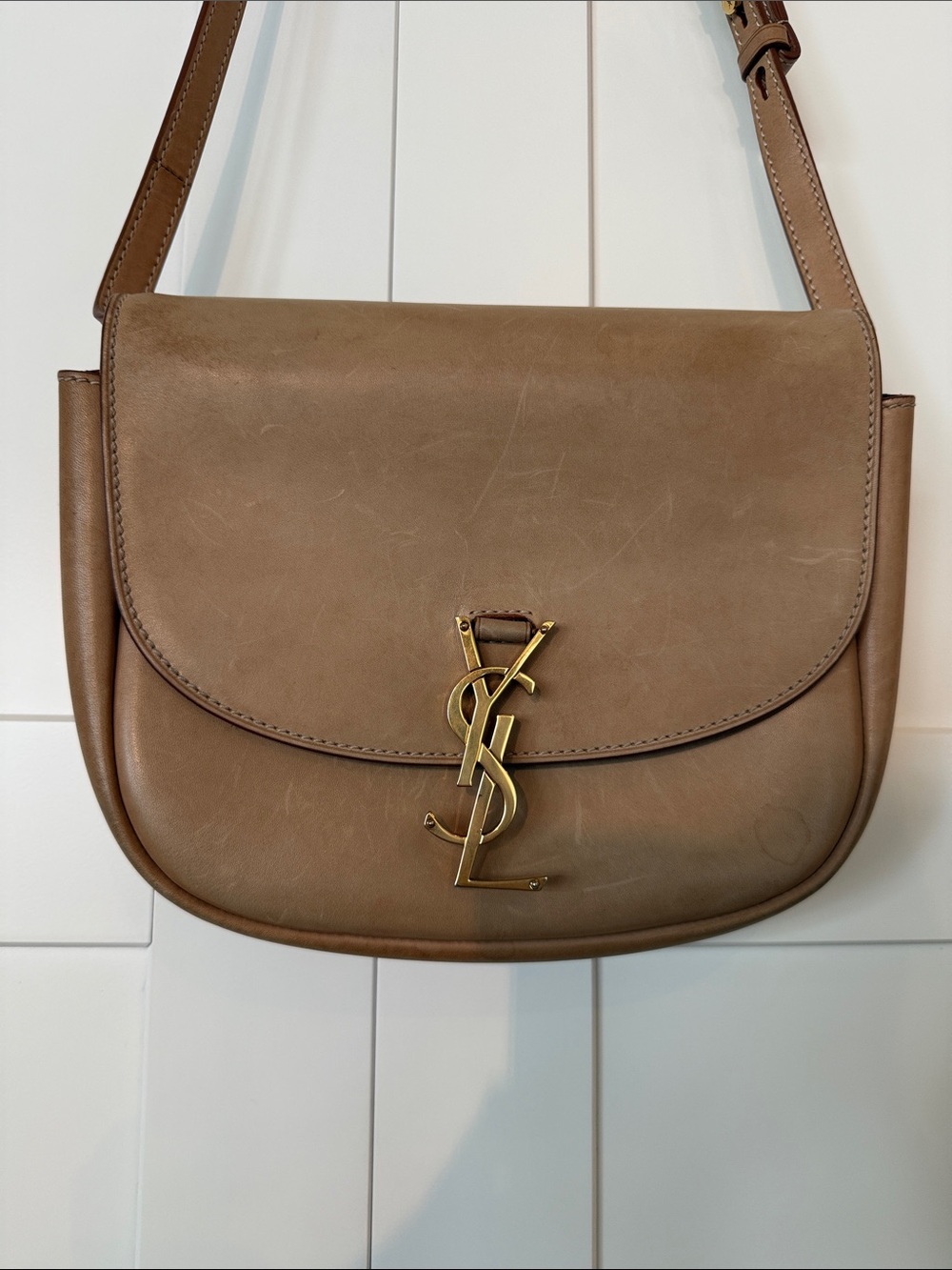 Saint Laurent Taupe Leather Saddle Crossbody with Gold YSL Emblem